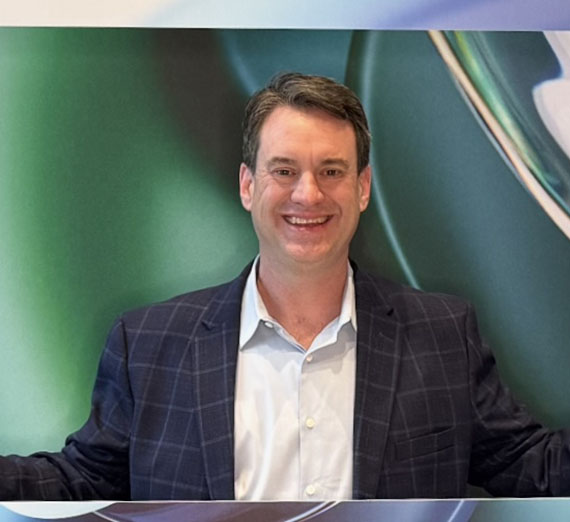 headshot of African alum Foday Kabba in suit